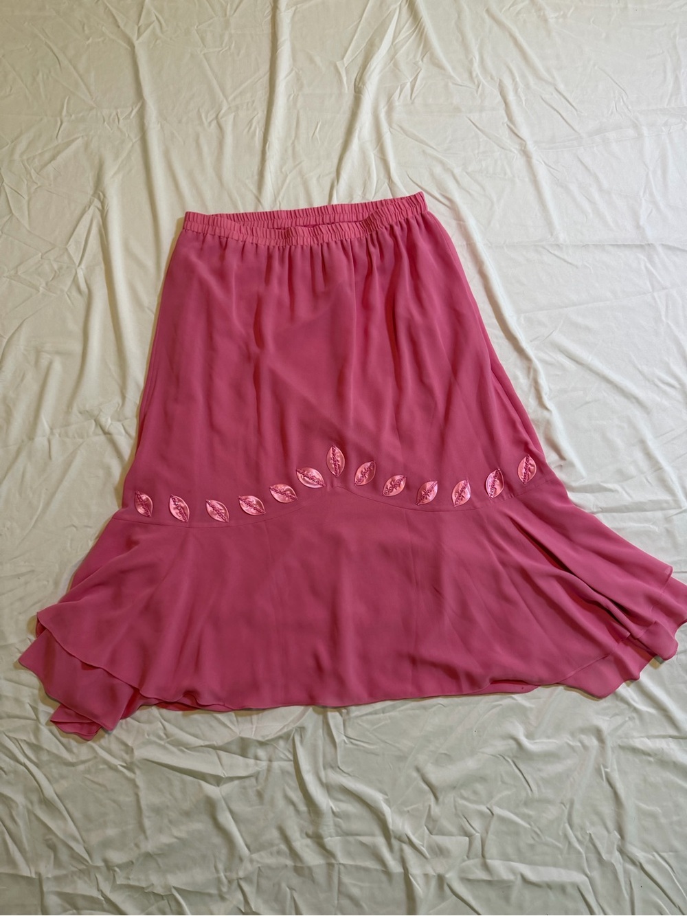 Flowing Pink Maxi Skirt with Leaf Embellishment